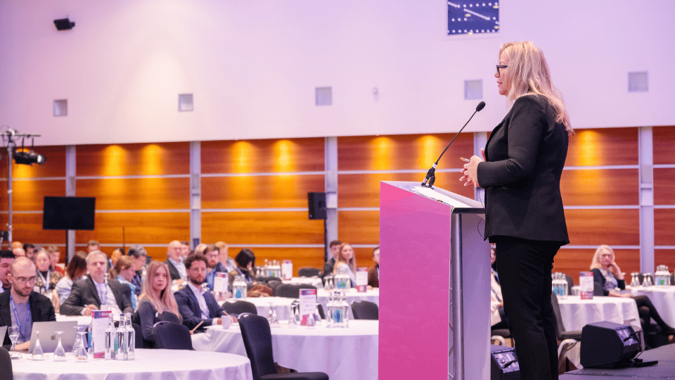 Woman Speaking to Audience